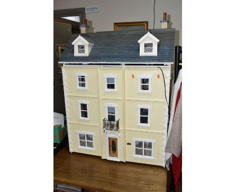 A LARGE WOODEN DOLLS HOUSE, a three storey house, The Ash by The Nottingham Dolls House Company, front opening to reveal six 