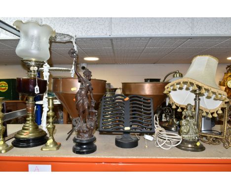 A GROUP OF METALWARE, comprising a pair of copper agricultural corn funnels, height 32cm, two brass table lamps, a pair of br