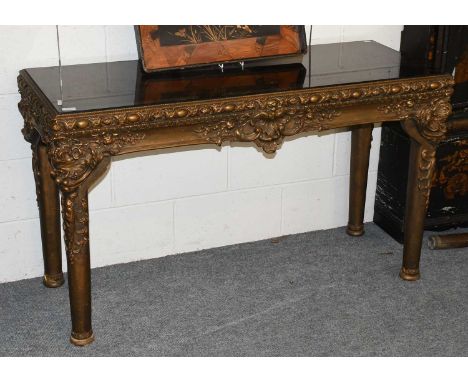 A Glass Topped Gilt Console Table, 20th century 135cm by 55cm by 78cm