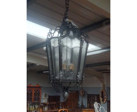 A Large Reproduction Wrought Iron Hanging Lantern, 115cm high