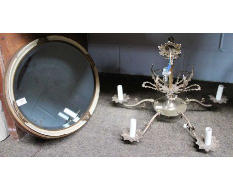 A Decorative 19th Century Style Oval Mirror, Edwardian, together with a brass five light ceiling light, cast with foliate des