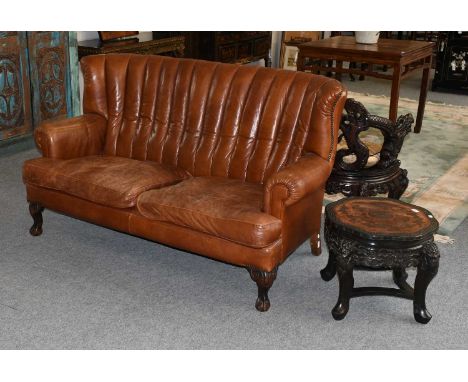 A Tan Leather High Back Two Seat Sofa, on carved cabriole supports, 172cm by 80cm 98cmThe leather is generally in good order.