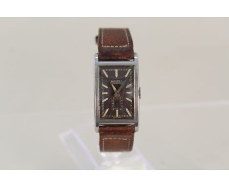 A 1930's gents Movado 'Curviplan' stainless steel wristwatch with inscription to back