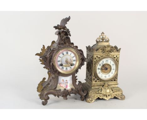 A late 19th Century brass mantel clock in the Rococo style with sevre style plaques plus a late 19th Century cast brass mante