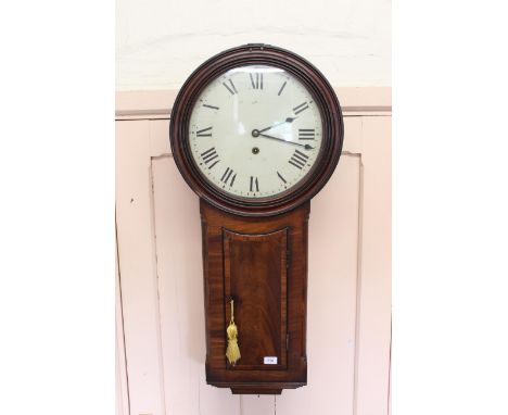 An early 19th Century mahogany trunk dial wall clock with well figured veneers to the case, moulded bezel and original painte