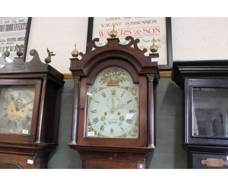 An early 19th Century mahogany long case clock with 8 day movement, the painted arched dial signed R Bullock, Beccles, 89" hi