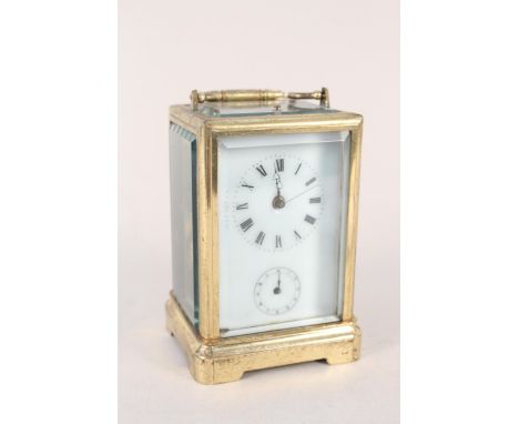 A 19th Century brass carriage clock with repeater and alarm movement