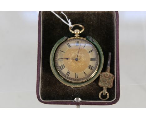 A continental 18ct gold fob watch with engine turned decoration (metal dust cover) in fitted box