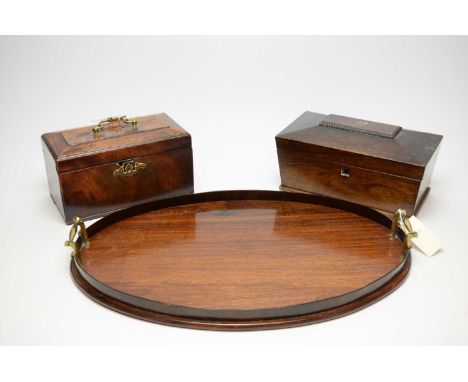 A 19th Century walnut tea caddy, the hinged lid with inset abalone, 28cms wide; together with a brass mounted 19th Century te