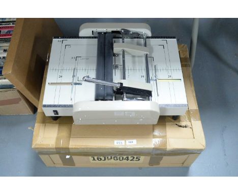 A Galaxy Print Finishing Booklet Making Machine, in box, with instruction manual.