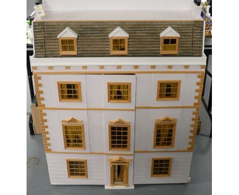 A 20th Century four storey white painted dolls house, with detachable roof panel and hinged front, 107cms high; together with