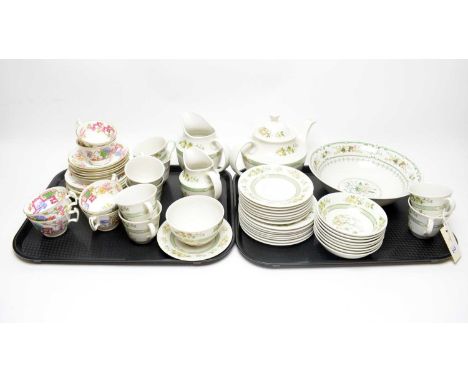 A Royal Doulton ‘Tonkin’ pattern part dinner and tea service, decorated with floral bouquets in shades of green, including te