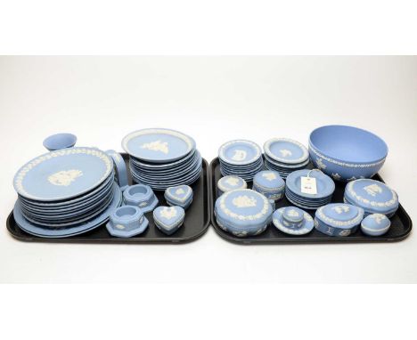 A collection of Wedgwood pale blue sprigged Jasperware, including: Christmas plates; pin dishes; trinket boxes with covers; c