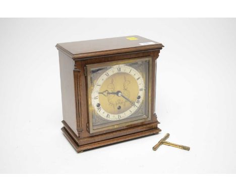 An Elliot 8-Day Lever Westminster &amp; Whittington Chime mantel clock, the mahogany case raised on brass bun feet, 23cms hig