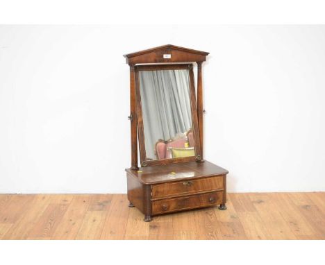 A 19th Century mahogany tilt action toilet swing mirror of architectural form, the pediment top over a mirror glass of archit