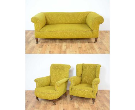 A collection of 19th Century Howard style furniture comprising of; a drop arm sofa, 190 x 90 x 75, wingback armchair, 90x 90 