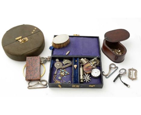 A selection of costume jewellery: a silver and enamel cased wristwatch, a metal snake pattern buckle with turquoise eyes, ano