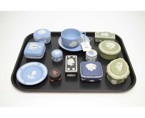A collection of Wedgwood Jasperware ceramics, including: ten various trinket boxes and covers; tea cup and saucer, and a pin 