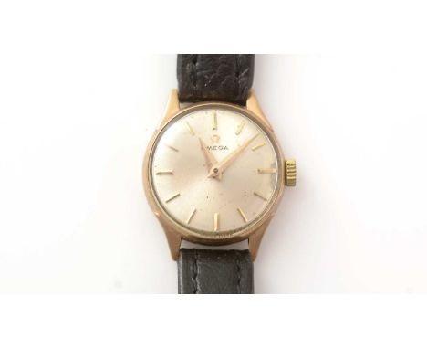 A 9ct yellow gold Omega cocktail watch, the baton dial fitted 245 cal manual wind movement, on leather strap.