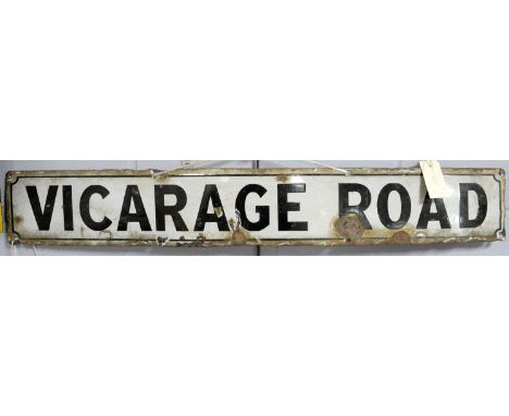 A Vicarage Road enamel street wall sign, of typical rectangular form, 13 x 87cms wide. 
