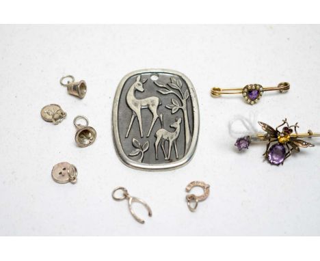 An Edwardian fly pattern brooch set with amethyst, citrine and ruby eyes, seed pearls to wings, 4cm wide; a heart shaped amet