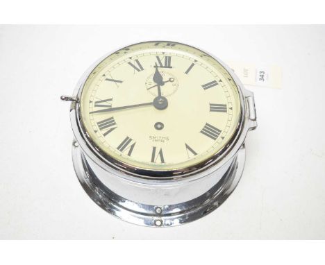 A nautical Smiths Empire ships clock, in chrome case, 18.5cms diameter.