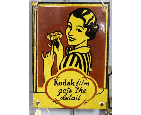 A Kodak enamel advertising sign, or rectangular form, with figural decoration and inscription ‘Kodak film gets the detail’, 2