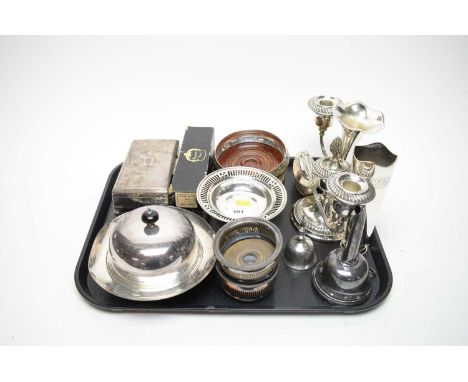 A collection of silver plated wares, including: Ronson table lighter; silver plated cigarette box; muffin dish with domed cov