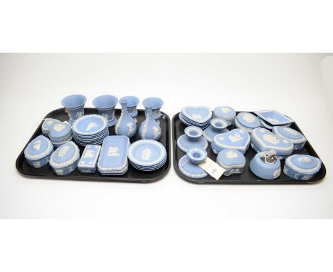 A collection of Wedgwood pale blue sprigged Jasperware, including: vases; pin dishes; trinket boxes with covers; table lighte