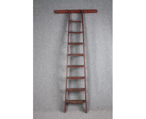 A vintage library ladder. H.210cm. 