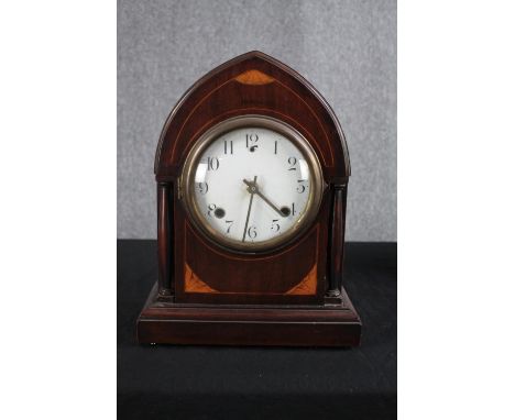 An Edwardian mahogany and satinwood mantel clock with a replacement modern movement. H.38 W.28 D.13cm. 