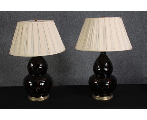 A pair of large glazed gourd form ceramic Heathfield table lamps. Each mounted with twin light fittings. H.71cm (each). 