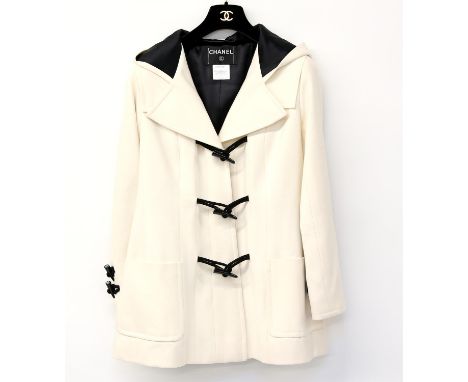 Chanel Duffle Coat labelled Autumn 06, size 42  with two front pockets, black silk lined hood and lining and 3 black Chanel t