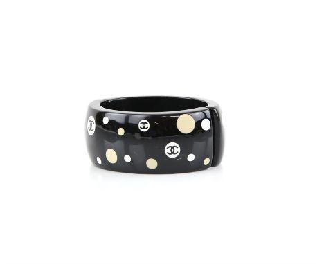 Chanel black resin cuff bangle with Chanel motif, boxed Condition Report:  Good overall condition very light scratching overa
