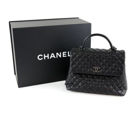 Chanel caviar leather quilted bag, with top handle, chain strap, interior zip pocket, 2 compartments, and back pocket, silver