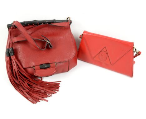 Gucci red grained leather shoulder bag with tassels and bamboo details together with a vintage clutch style bag with removabl