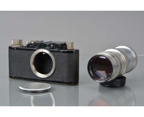 A Leitz Wetzlar Leica II Model D Rangefinder Camera Body,  black, serial no 96145, 1932, shutter working, body G, some brassi