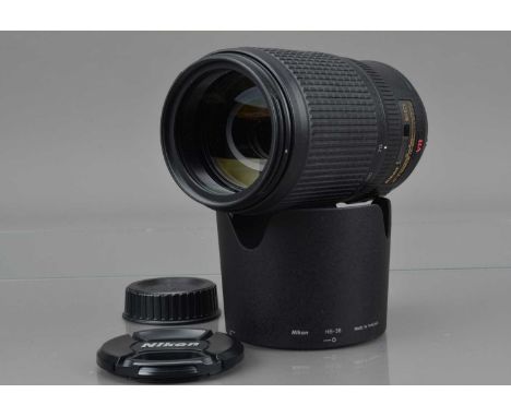 A Nikon AF-S Nikkor 70-300mm f/4.5-5.6G ED VR Lens,  serial no 3074969, auto focusing working, barrel VG, elements VG, with H