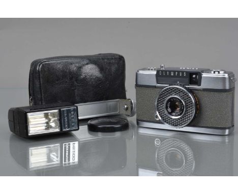 An Olympus Pen EE Half Frame 35mm Camera,  shutter working, light cell/aperture responsive, body G, elements VGm with Olympus