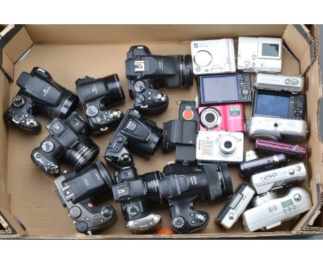 A Tray of Digital Cameras, including Fujifilm Finepix models, a Canon SX1 IS, SX20 IS, Nikon  Coolpix L120 and a group of com