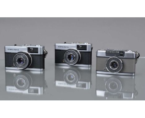 Three Olympus Compact Cameras, two Olympus Trip 35, shutters working, light cells responsive, bodies G, elements G and a Pen-