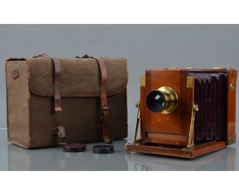 A J.T Chapman ''The British'' Mahogany and Brass Field Camera, body G-VG, bellows G, with  J H Dallmeyer No 4 Stigmatic Serie