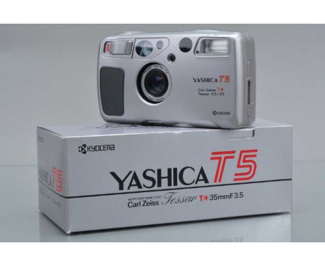 A Yashica T5 Compact Camera, silver, powers up, shutter working, flash/flash modes working, self timer working, body G-VG, th