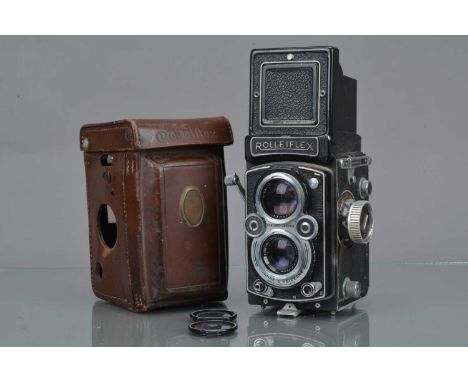 A Rolleiflex MX-EVS TLR Camera, serial no 1471812, shutter working, body F, paint wear, scratches to back edges, some lifting