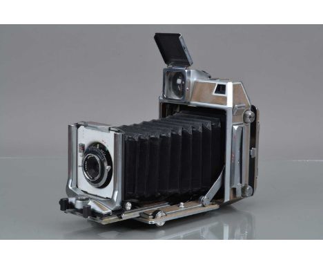 A Linhof Super Technika IV 6 x 9 Camera,  serial no 89723, all moves freely, body G, some blemishing to leatherette, bellows 