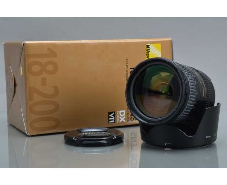 A Nikon DX AF-S Nikkor 18-200mm f/3.5-5.6G II ED VR Lens, auto focusing working, barrel G-VG, elements VG, with front & rear 