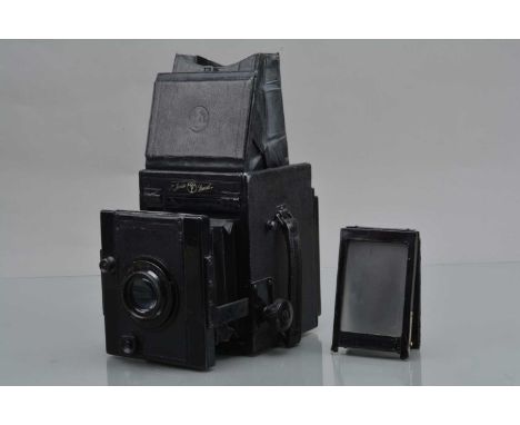 A Thorton Pickard Junior Special Reflex Camera, shutter working, bottom part of curtain dragging in runner, body G, viewing h