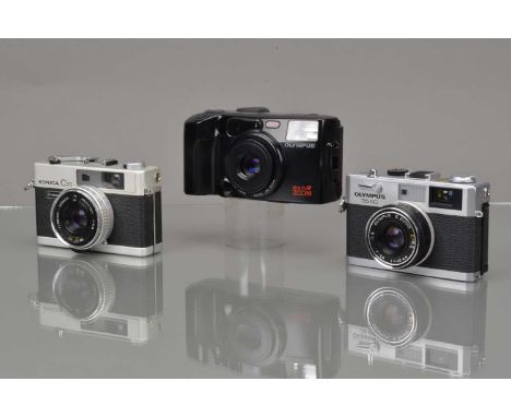 Three Compact Cameras, a Konica C35, shutter working, meter responsive, F-G, Olympus 35 RC, shutter working, self timer stutt