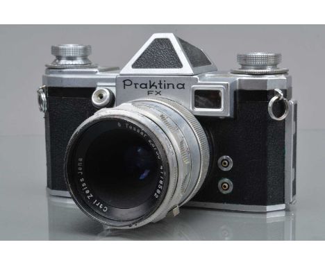 A KW Praktica FX SLR Camera, shutter working, elf timer working, body G, body G, with Carl Zeiss Jena 50mm f/2.8 pre set Tess