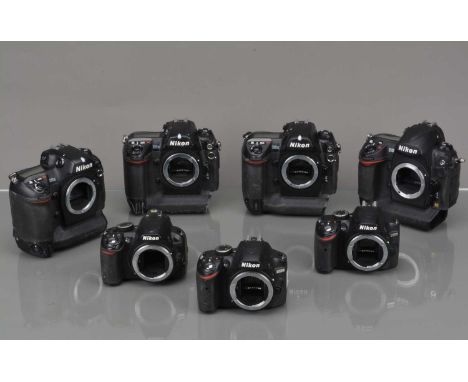 A Group of Nikon DSLR Camera bodies, a Nikon D3, D2X, two D2H, a D3100 and two D3200, no batteries/chargers, all untested, bo